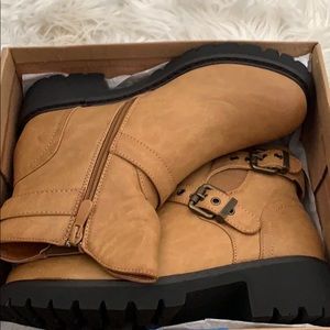 Tan and black moto boots